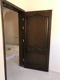 رش أبواب خشب بالرياض